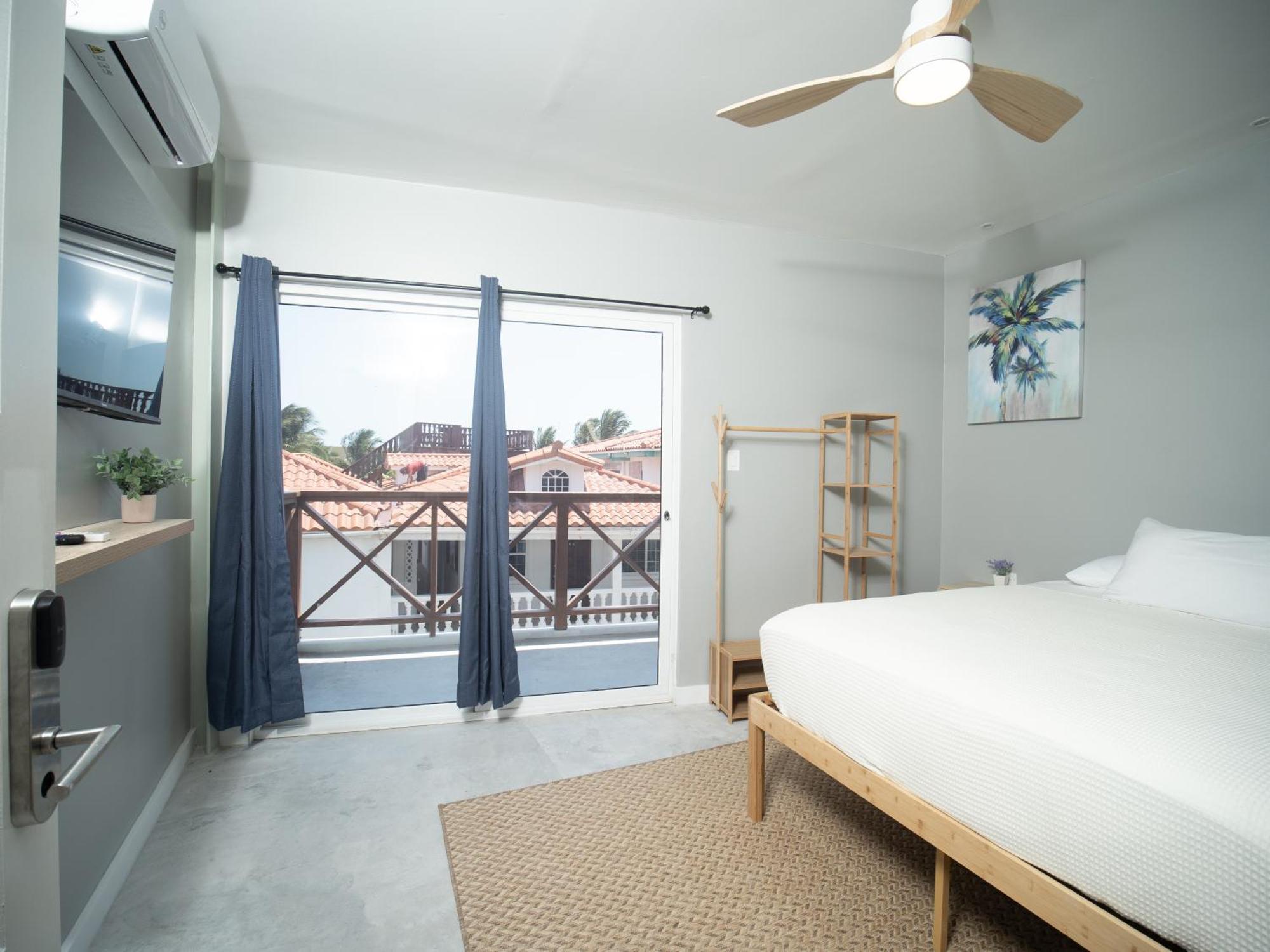 Sandbar Beachfront Hostel & Restaurant San Pedro  Oda fotoğraf